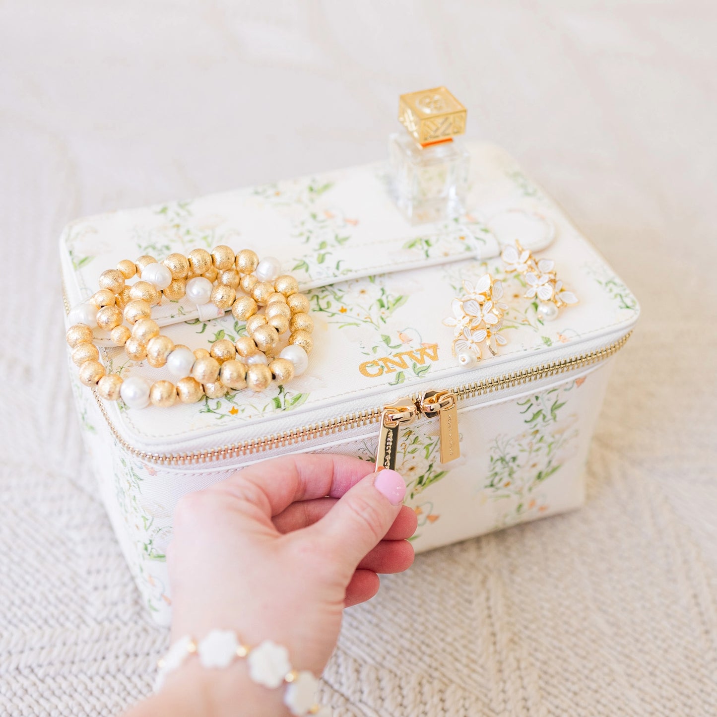 neely and chloe for petite keep large vanity case in garden gala print styled image